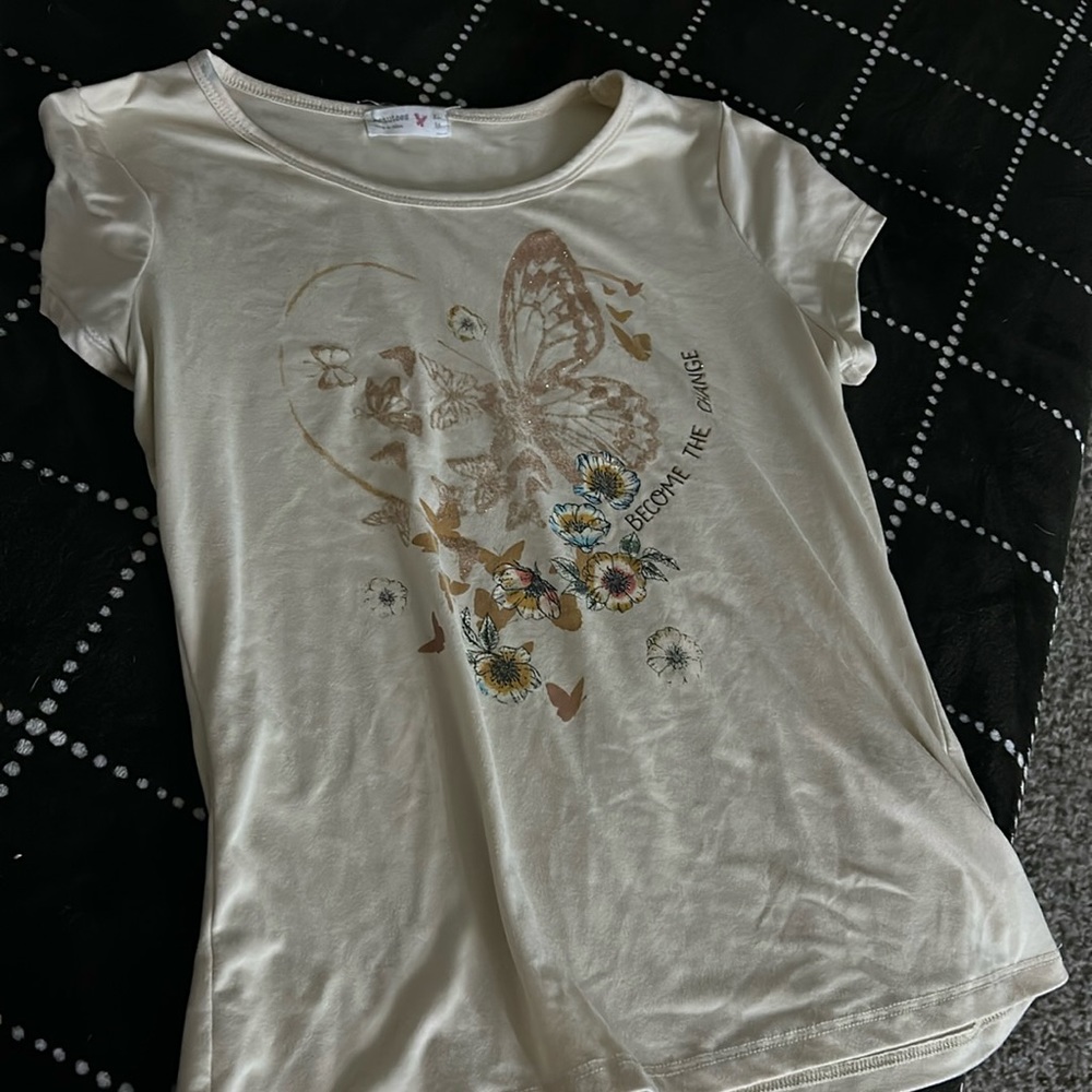 The brand is beautees the color is a tannish creamish. It is a size 16 in kids.